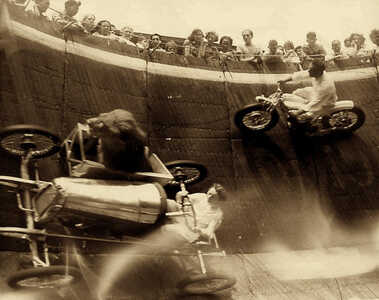 A lion rides in the sidecar during a performance of The Wall of Death carnival attraction at Revere Beach, Massachusetts in 1929 A lion rides in the sidecar during a performance of The Wall of Death carnival attraction at Revere Beach, Massachusetts in 1929